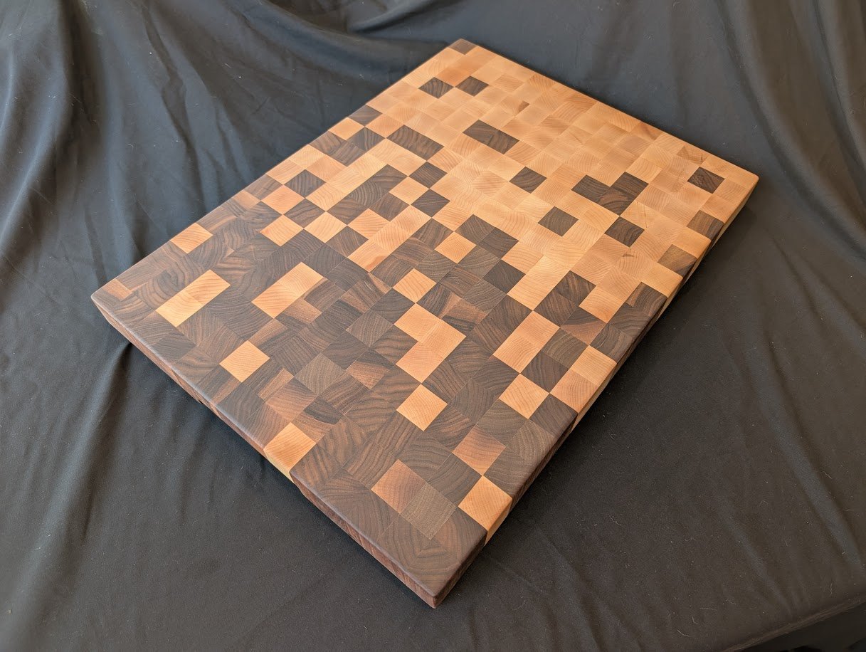 Signature pixelated end grain cutting board