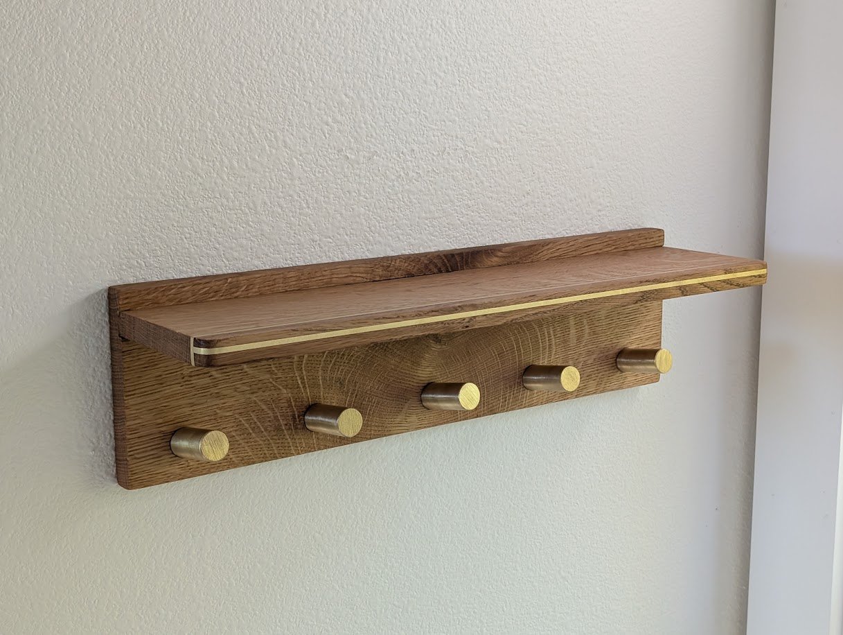 White oak coat rack with brass inlay