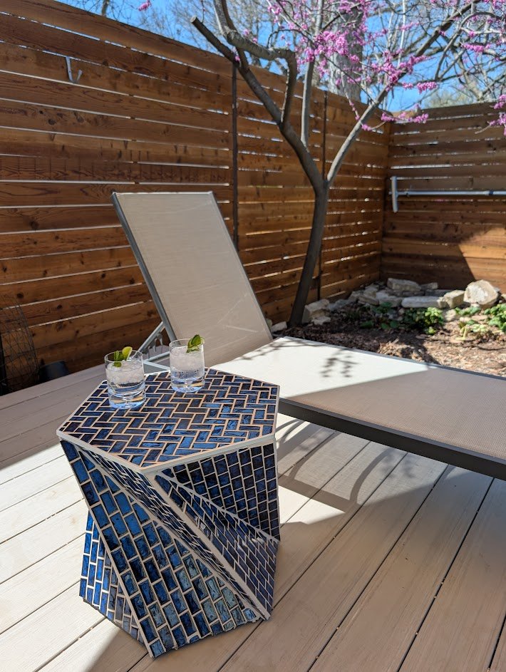 Blue tile poolside table